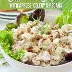 Pin for Tarragon Chicken Salad with apples, celery and pecans, image of large bowl filled with chicken salad with green lettuce around.