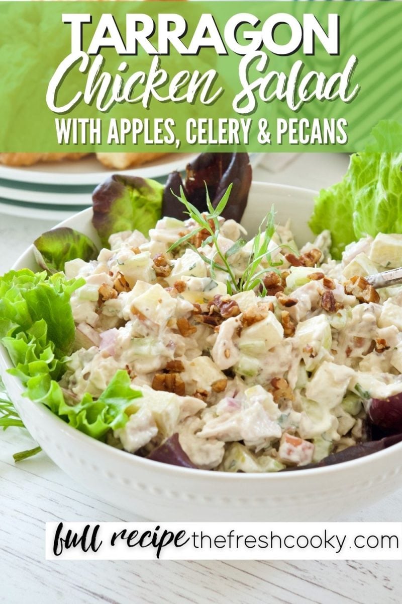 Pin for Tarragon Chicken Salad with apples, celery and pecans, image of large bowl filled with chicken salad with green lettuce around.