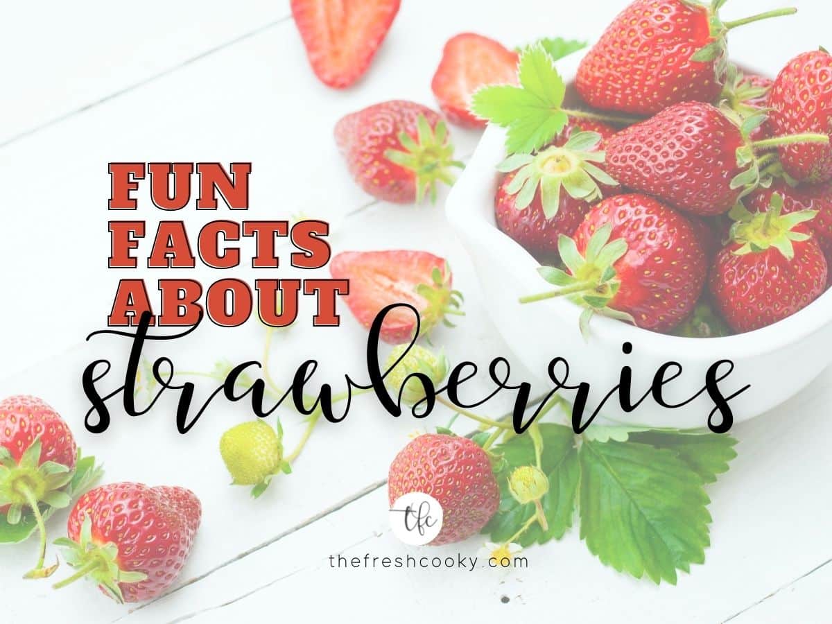 facebook image for fun facts about strawberries with dish of strawberries with vine in background.