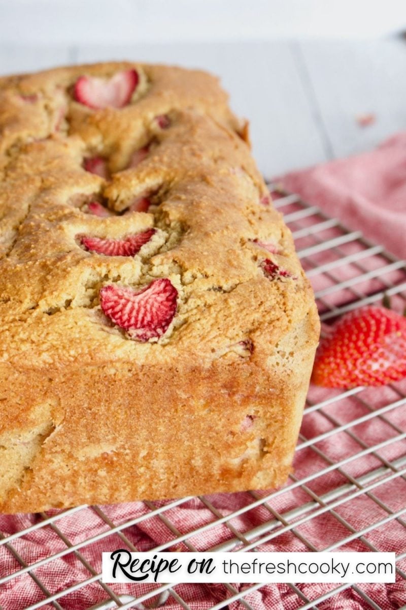 Pin for strawberry bread with image of loaf of fresh baked strawberry bread on wire cooling rack.