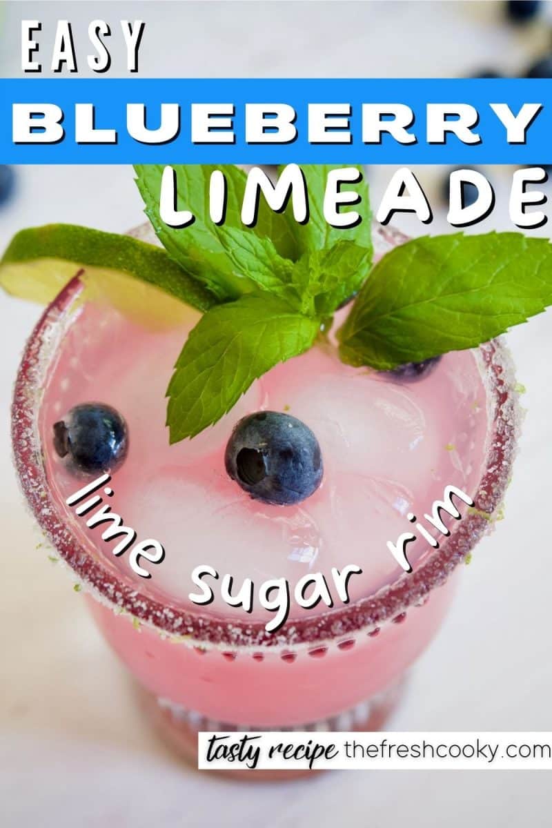 Blueberry Limeade Drink with top down shot of sugar rimmed glass filled with blueberry limeade.