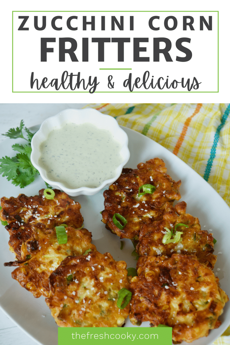 Healthy and delicious zucchini corn fritters on a plate with a bowl of ranch dressing for dipping.