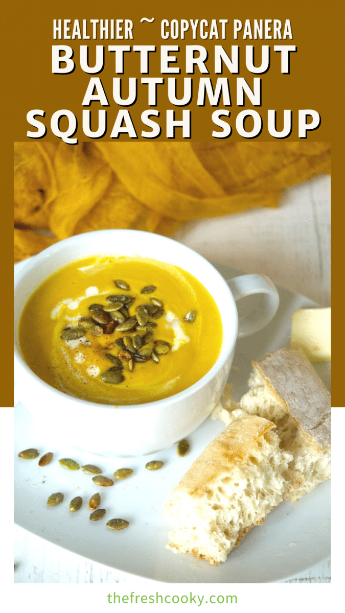 Copycat Panera Autumn Squash Soup pin with image of bowl of soup with pepitas and fresh french bread on the plate.
