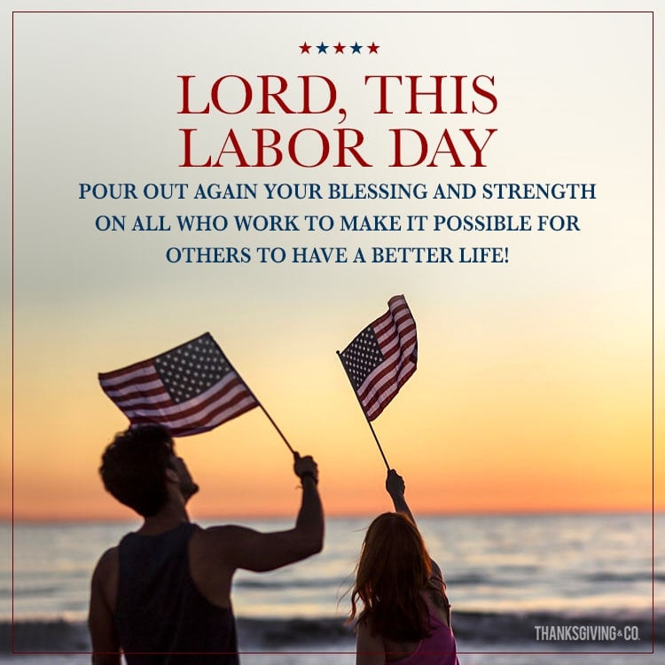 Labor Day prayer with an adult and child waving American flags watching the sunset at the beach.