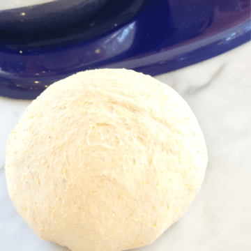 cropped-deep-dish-pizza-dough-shaped-into-ball.png
