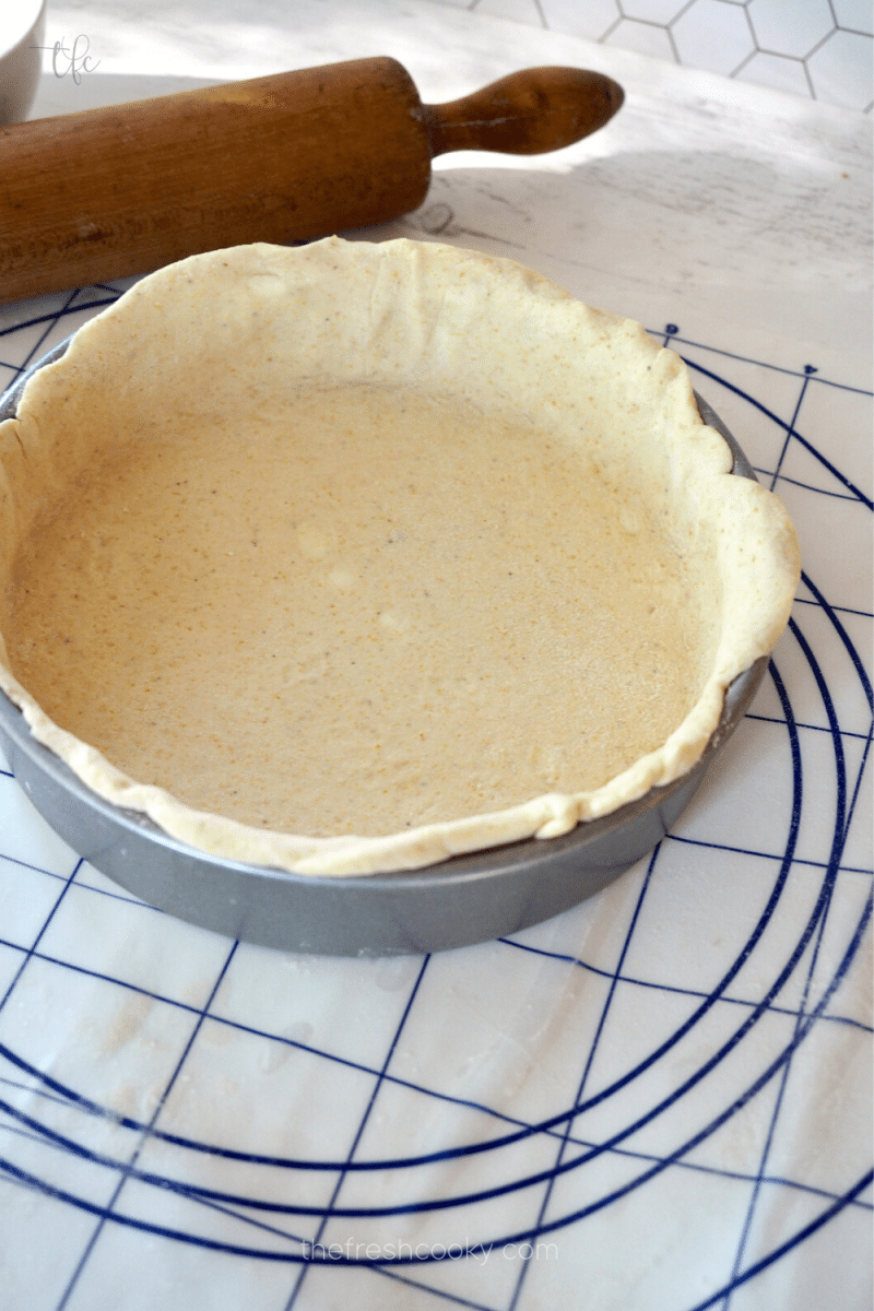 Deep dish Butter crust pizza dough pressed into deep dish pizza pan.