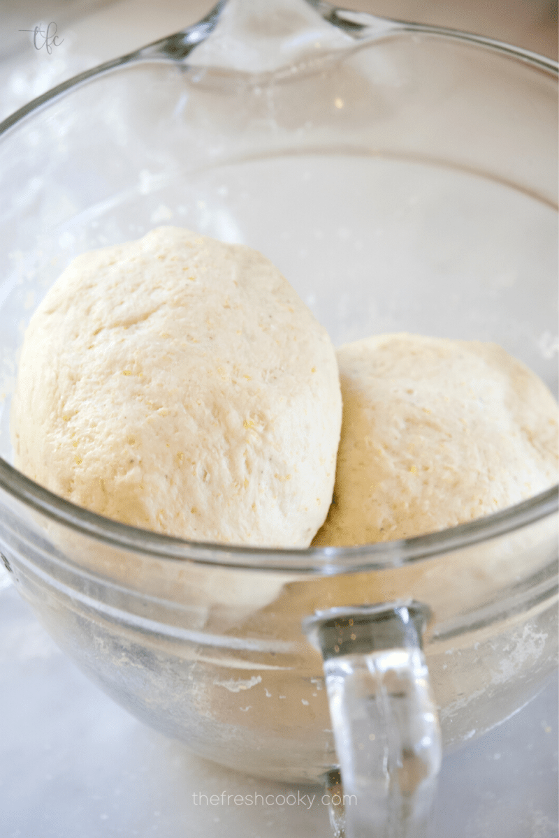 Post buttering deep dish pizza dough balls back in bowl for second rise.e. 