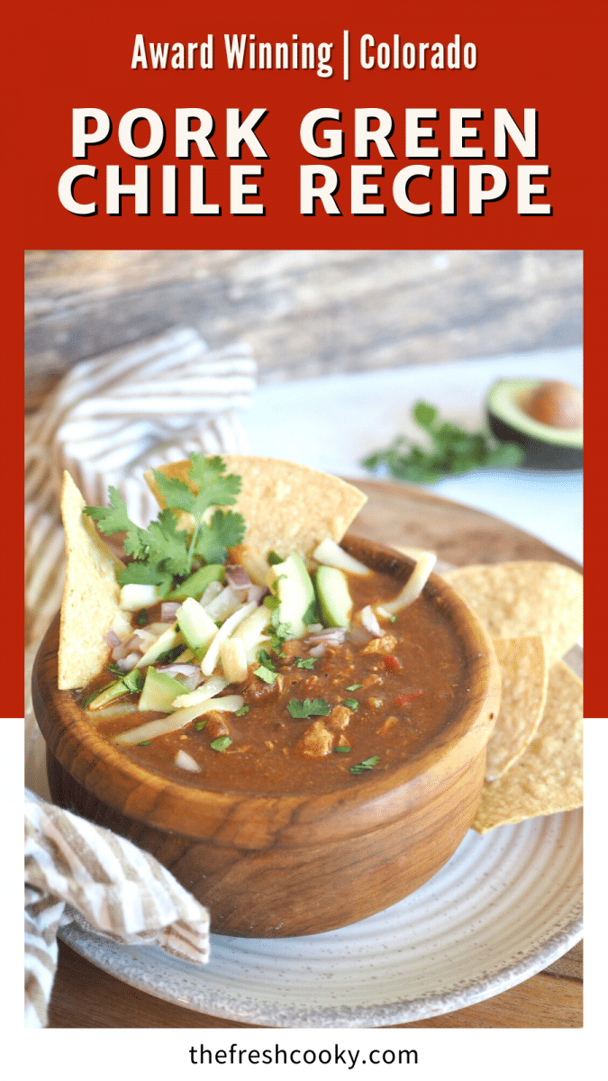 Pork Green Chile recipe pin with image of green chili in a wooden bowl with a garnish.