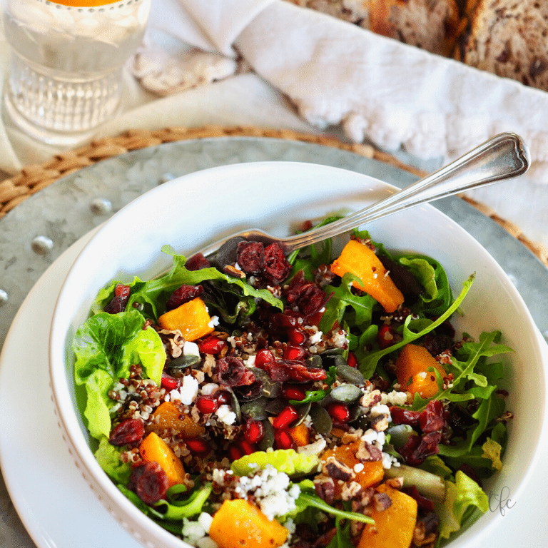 Fall harvest salad with roasted butternut squash and quinoa.