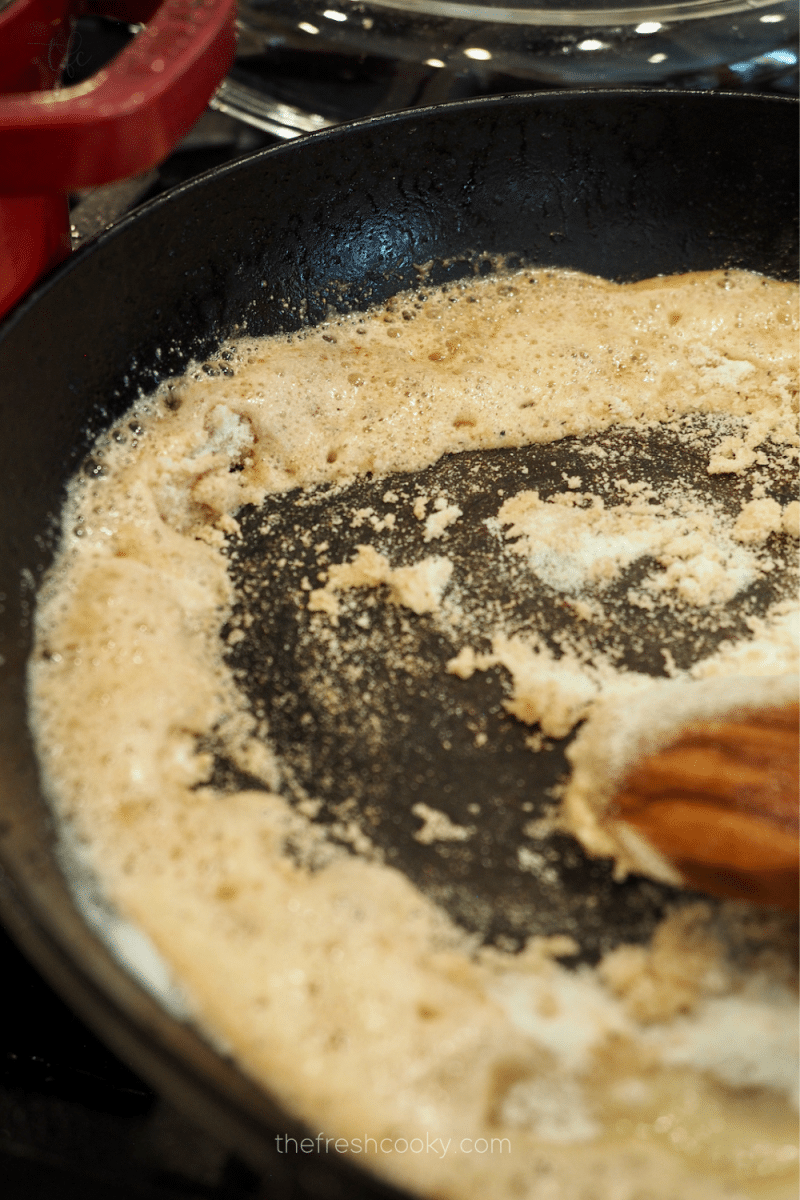 Making roux with butter and masa flour in pan. 