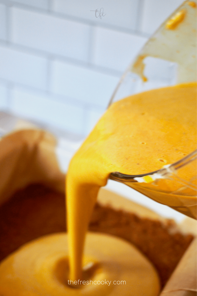Pour pumpkin filling into baked biscoff cookie crust. 