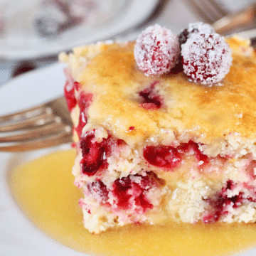 Cranberry Christmas Cake on plate with sugared cranberries
