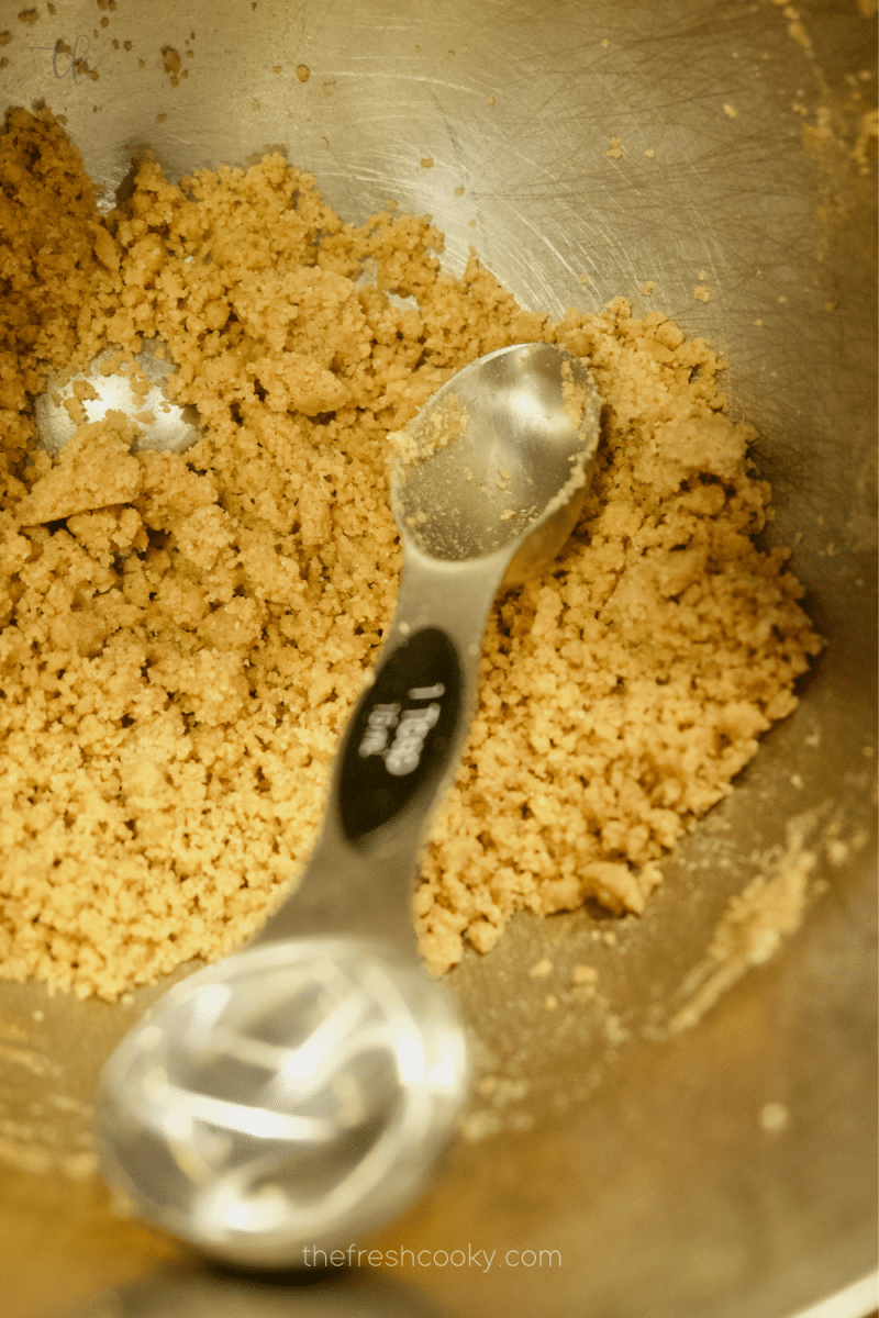 Tablespoon in crumbly pfeffernusse batter for cookie shaping. 