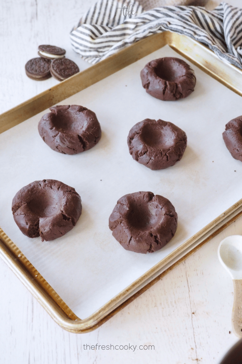 Full size Chocolate Oreo Cookies with indentations for even baking. 