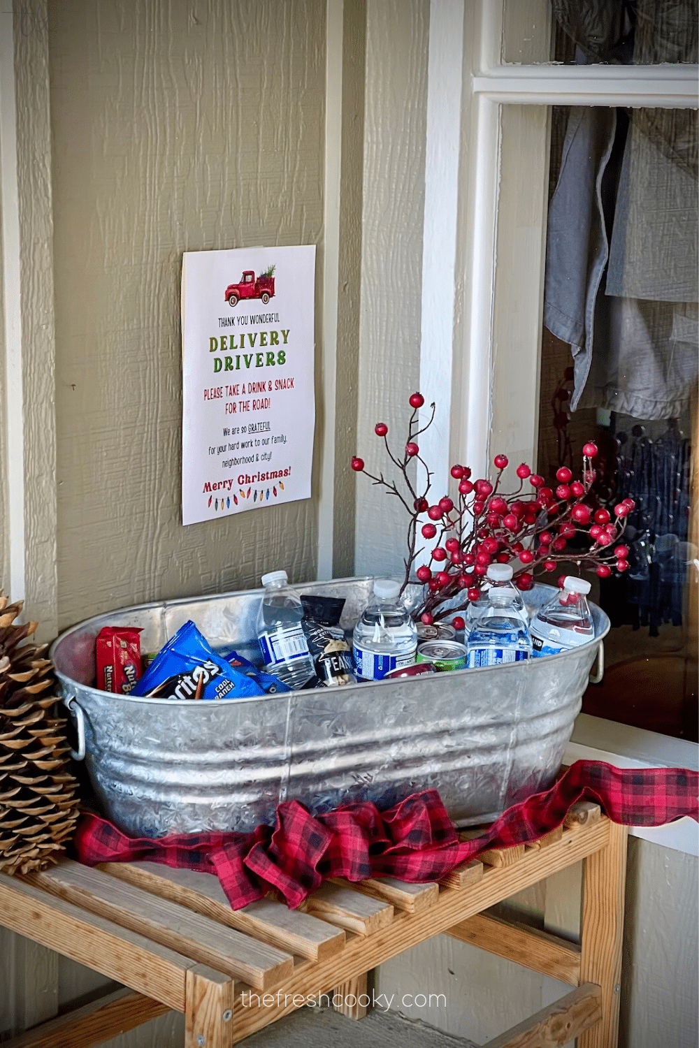 Image of Delivery Driver Thank you printable on wall with snack bin filled with drinks and snacks.