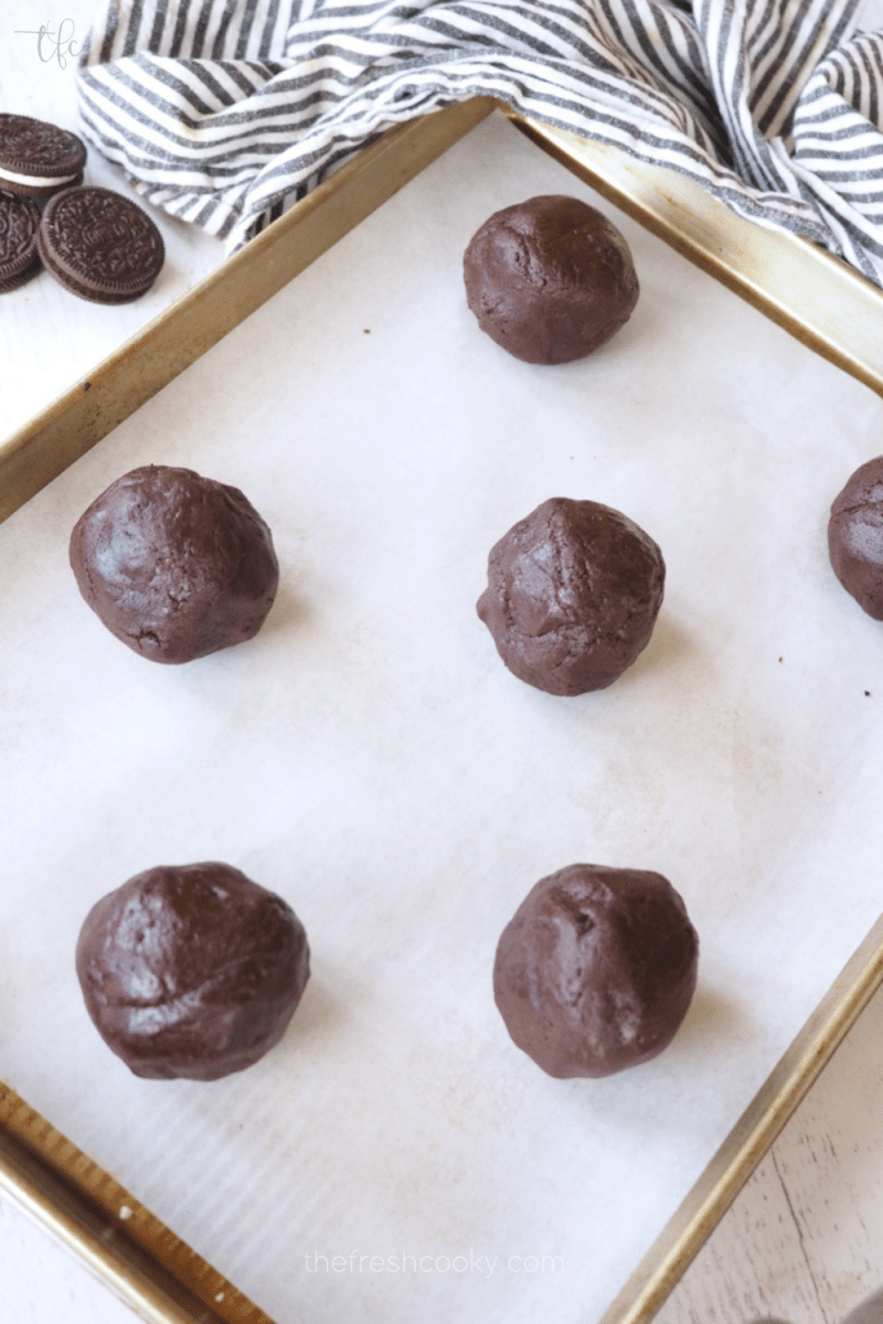 Oreo Cookie dough balls for giant cookies with 6 on a half sheet pan. 