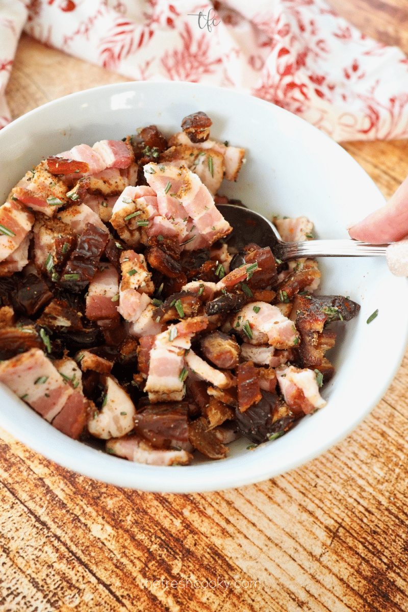 Stirring bacon and dates mixture.