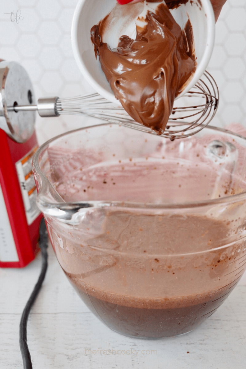 Adding Nutella for Ferrero Rocher Ice Cream.
