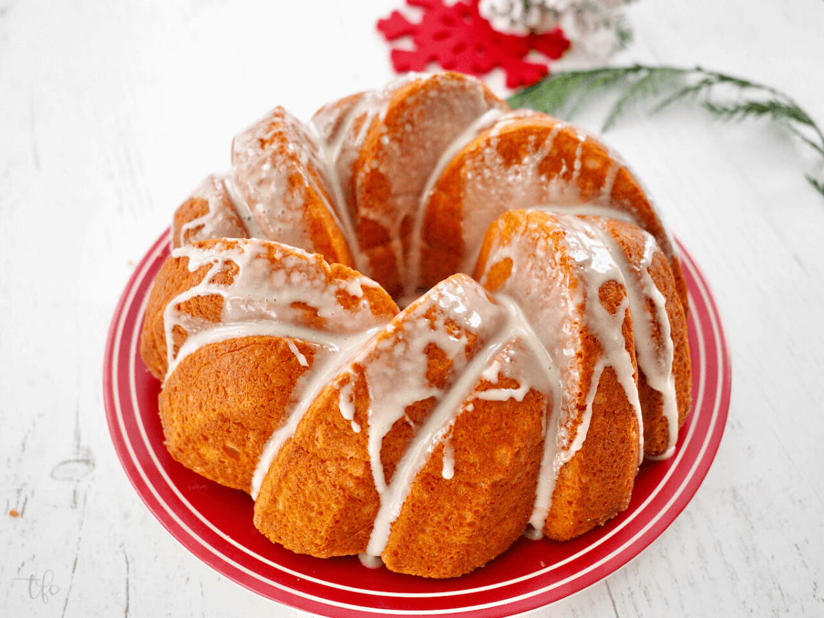 Eggnog coffee cake in bundt shape with eggnog glaze.