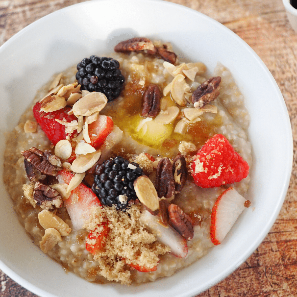 Instant Pot Oatmeal Recipe square image of top down shot of loaded bowl of steel cut oatmeal.