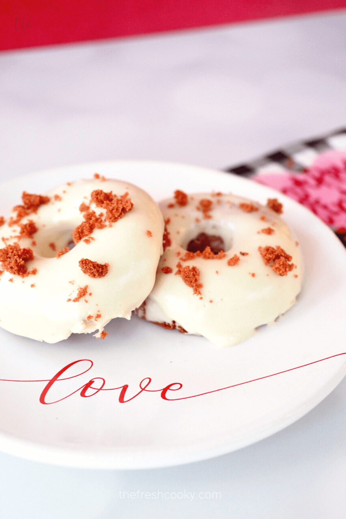 Red Velvet Donuts on a plate that says love.