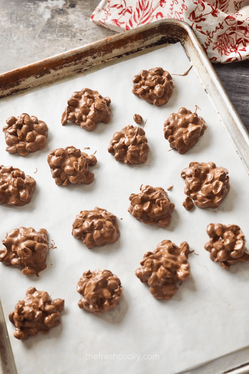 Crockpot Peanut Clusters on baking sheet to cool. 