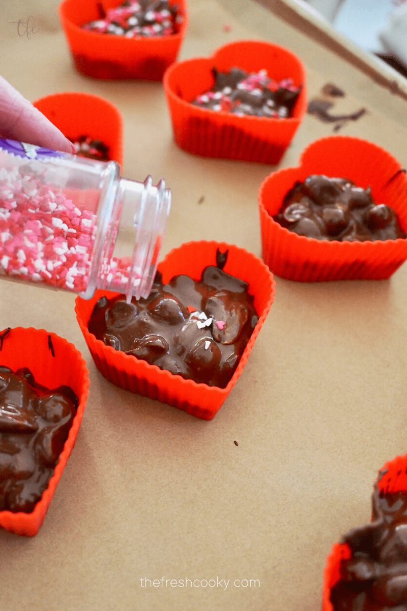 Add sprinkles while peanut clusters are still gooey.