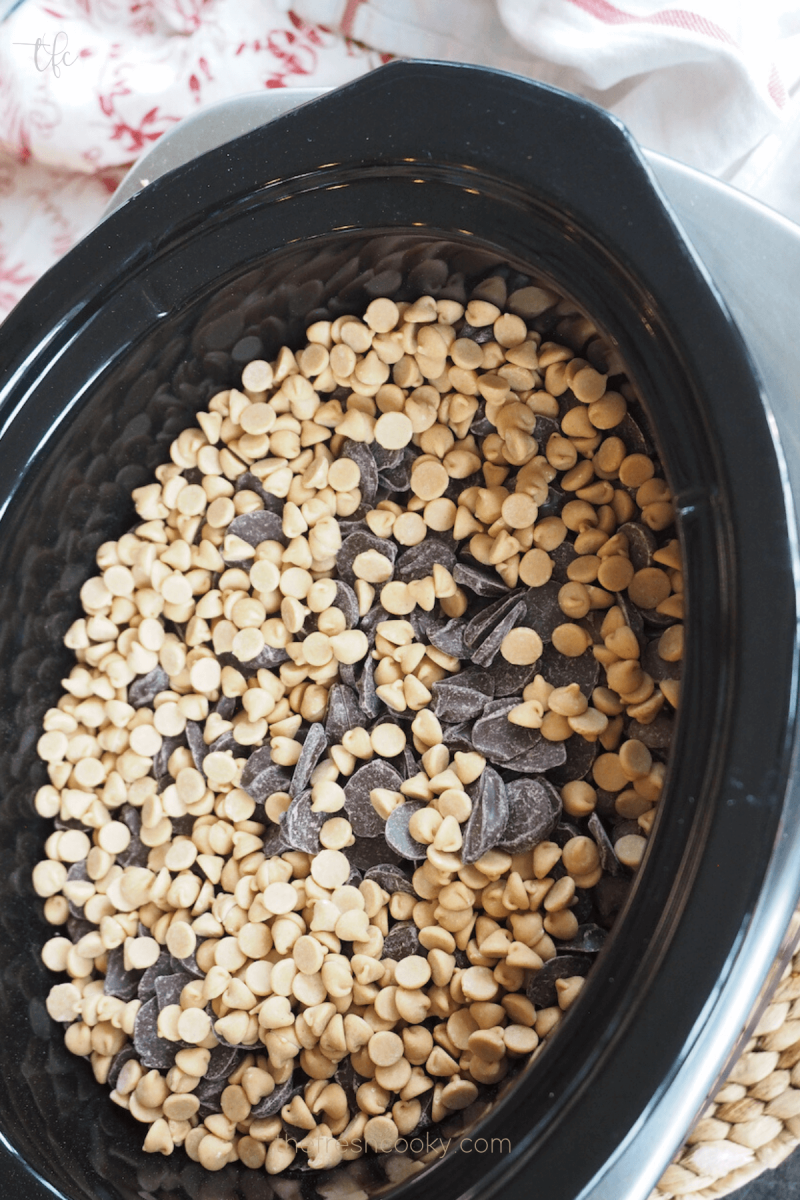 Crockpot layered with peanuts, dark and milk chocolate chips, peanut butter chips. 