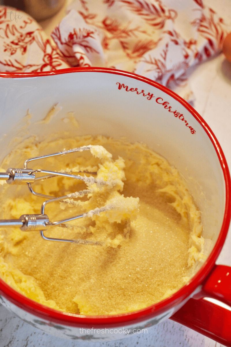 Butter and sugar creamed together for eggnog coffee cake. 