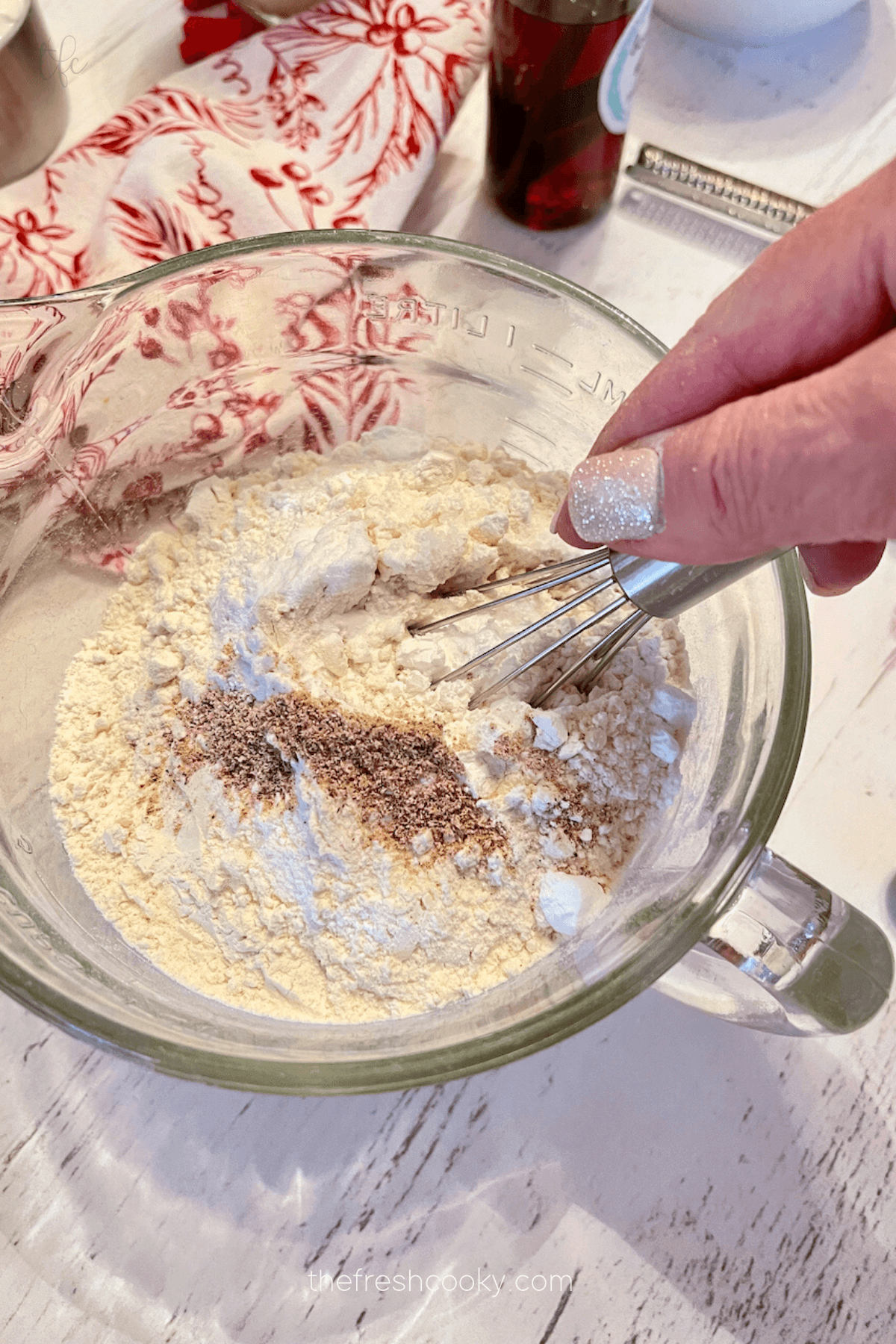 Whisking dry ingredients together. 