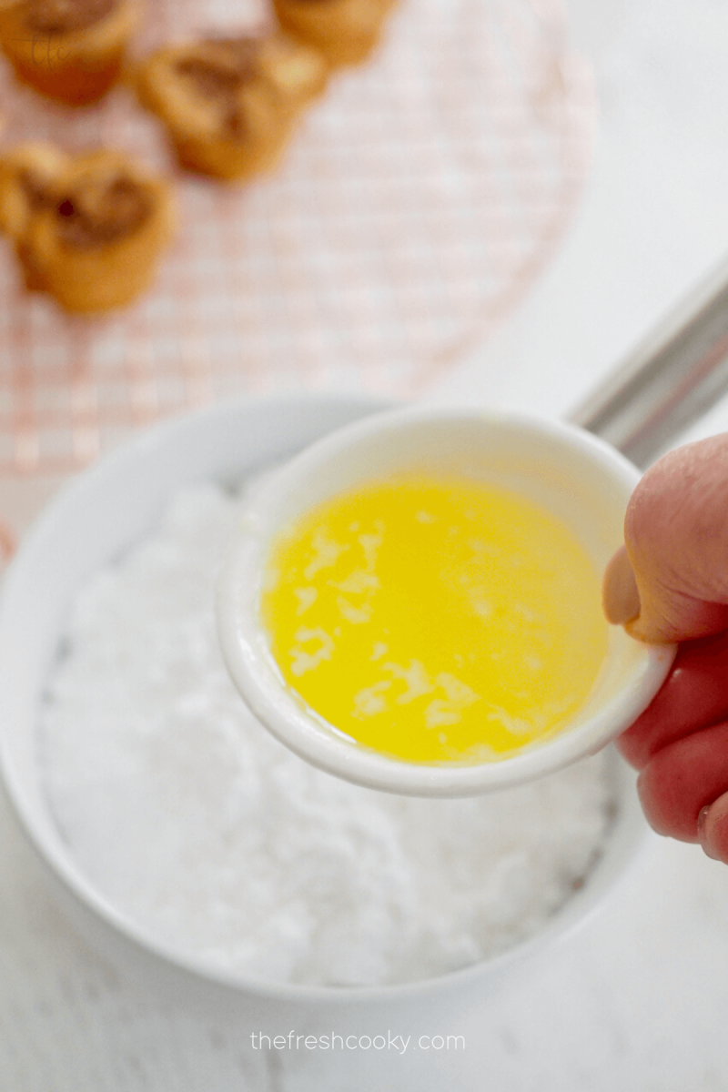 Adding optional melted butter for glaze for mini king cakes. 