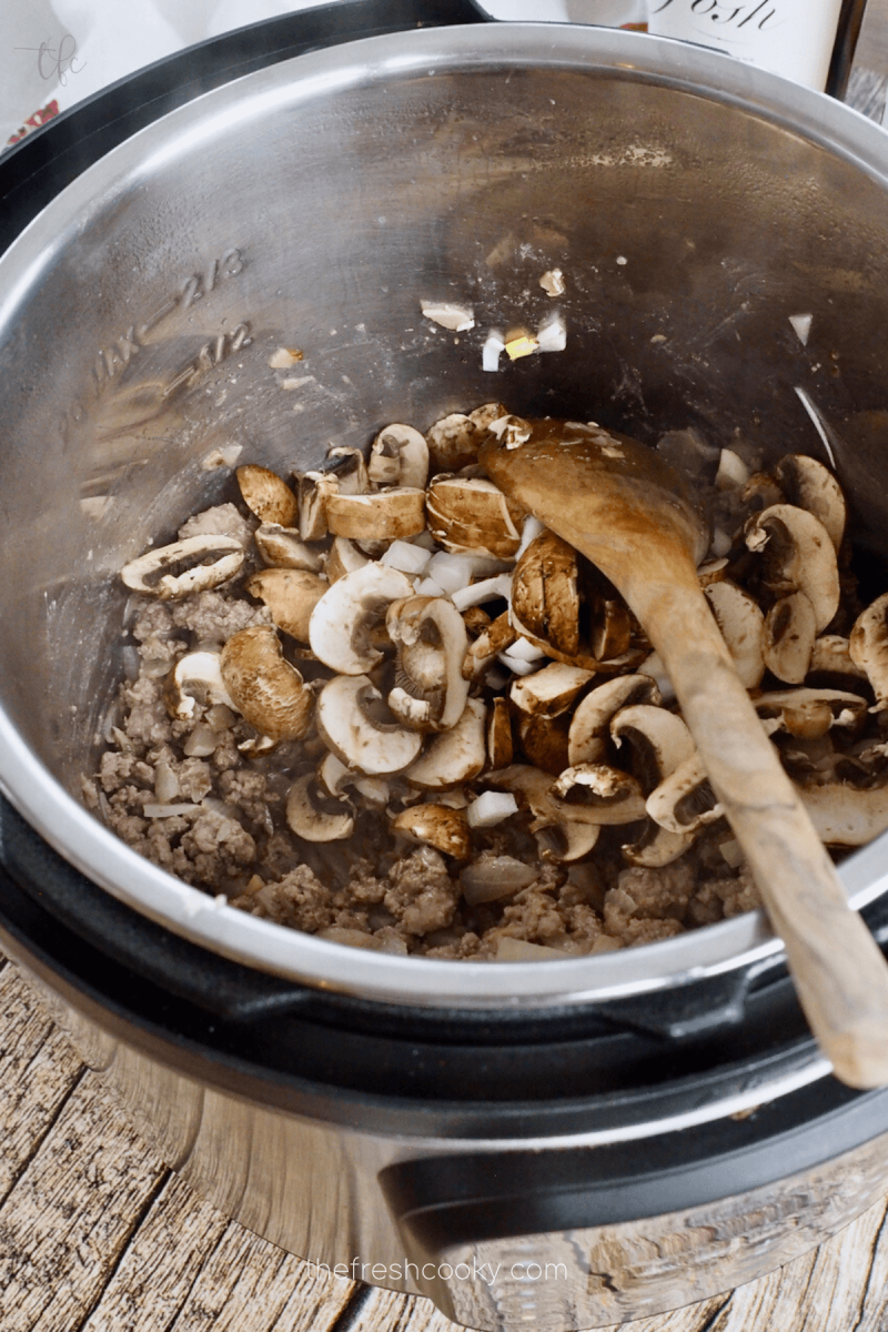 Sautéing mushrooms for Instant Pot ground beef stroganoff.