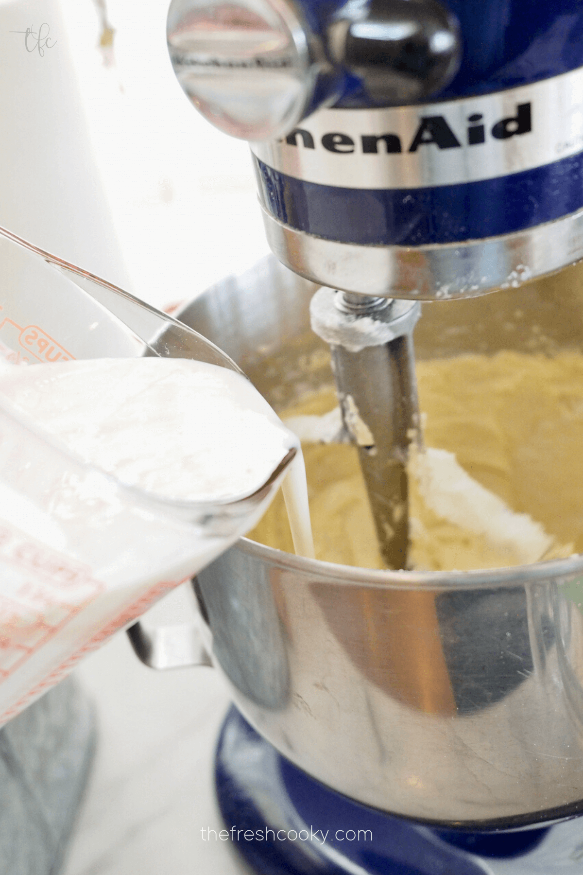 Adding buttermilk mixture between flour mixture. 