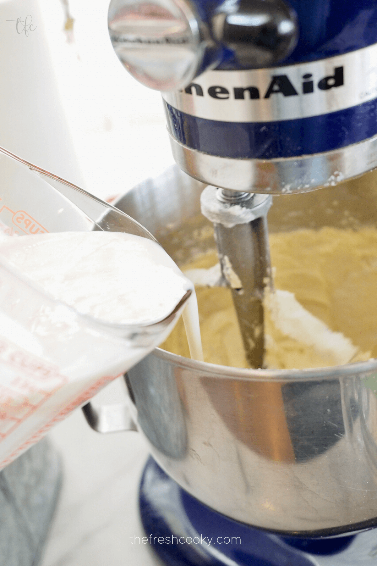 Adding buttermilk mixture between flour mixture.