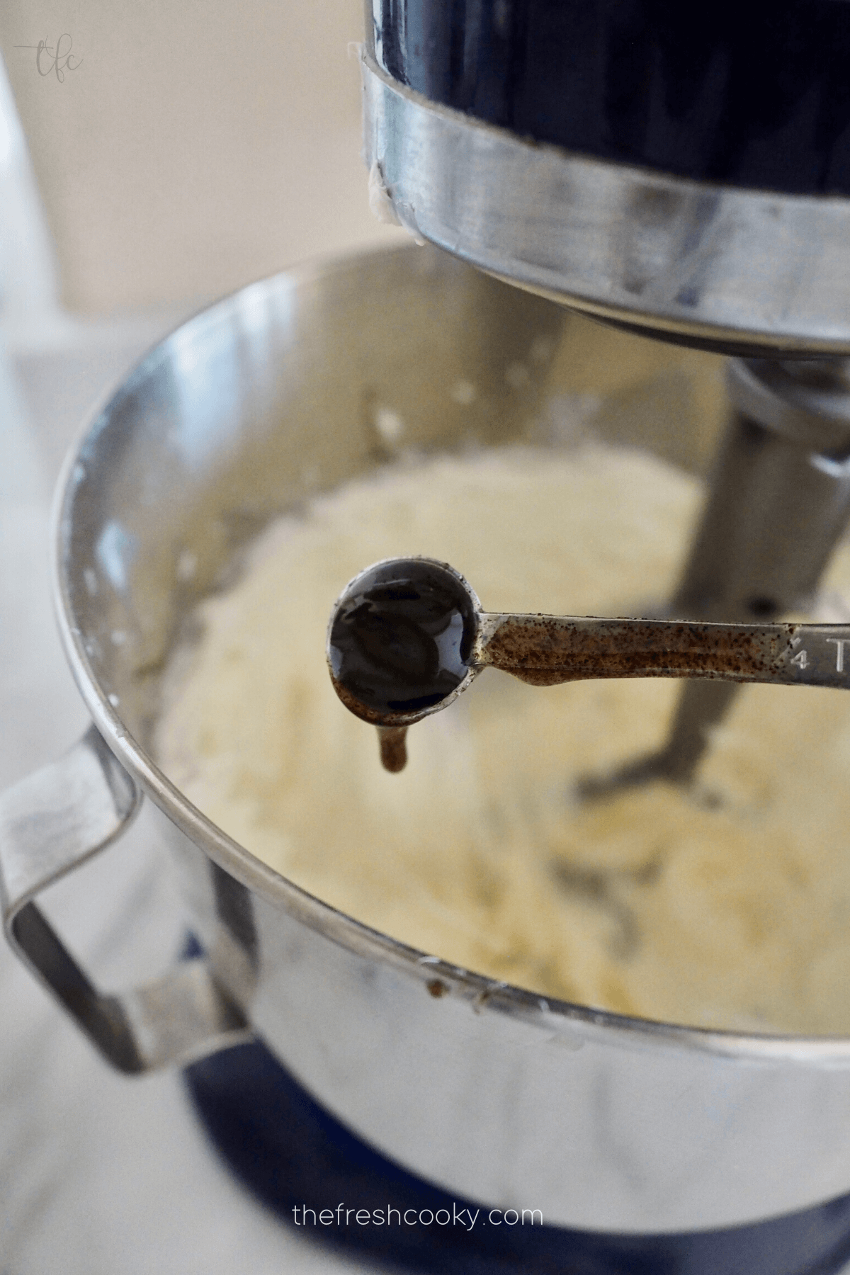 Add vanilla bean paste to cream cheese frosting mixture.