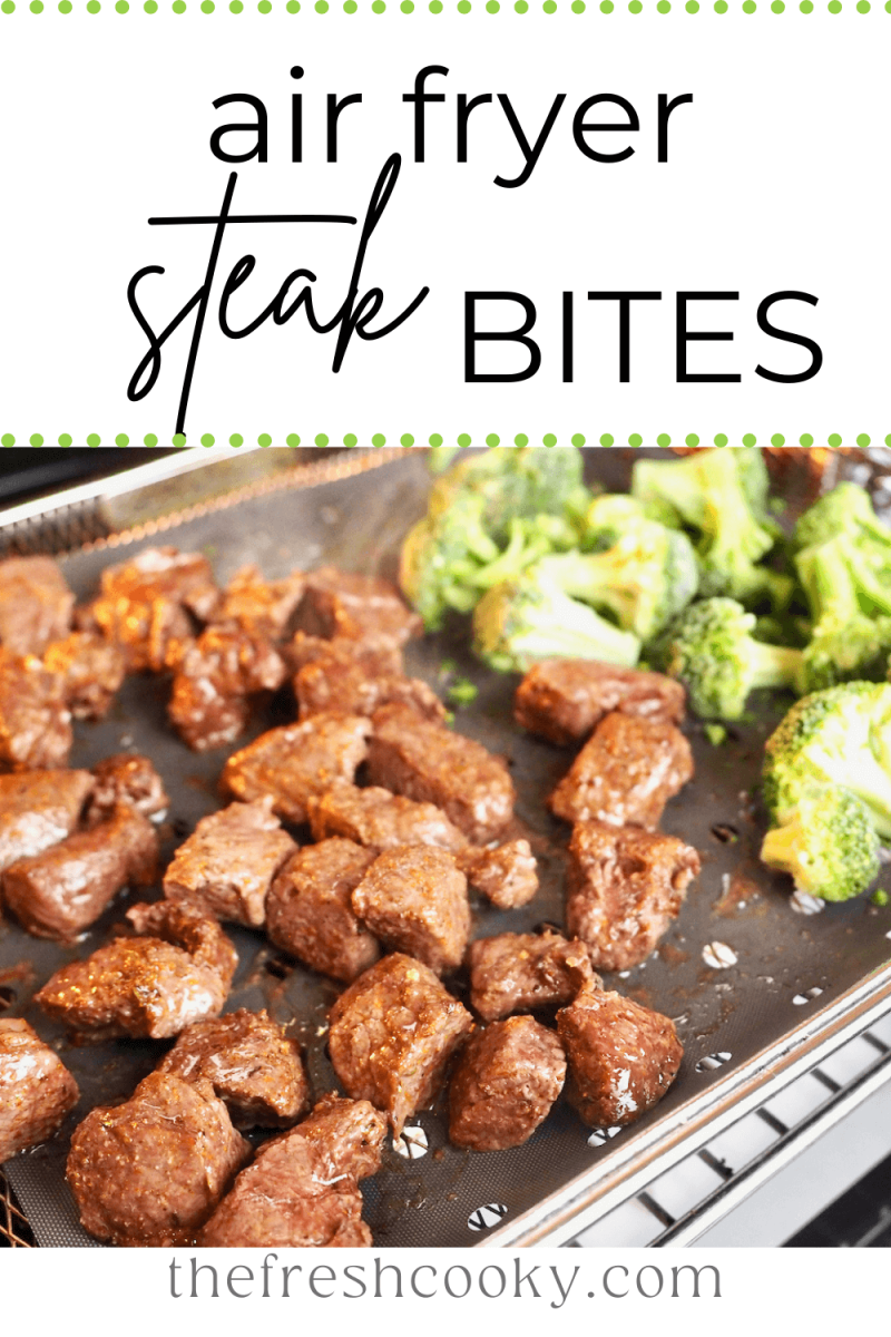 Air Fryer steak Bites or tips on air fryer tray cooking with broccoli.