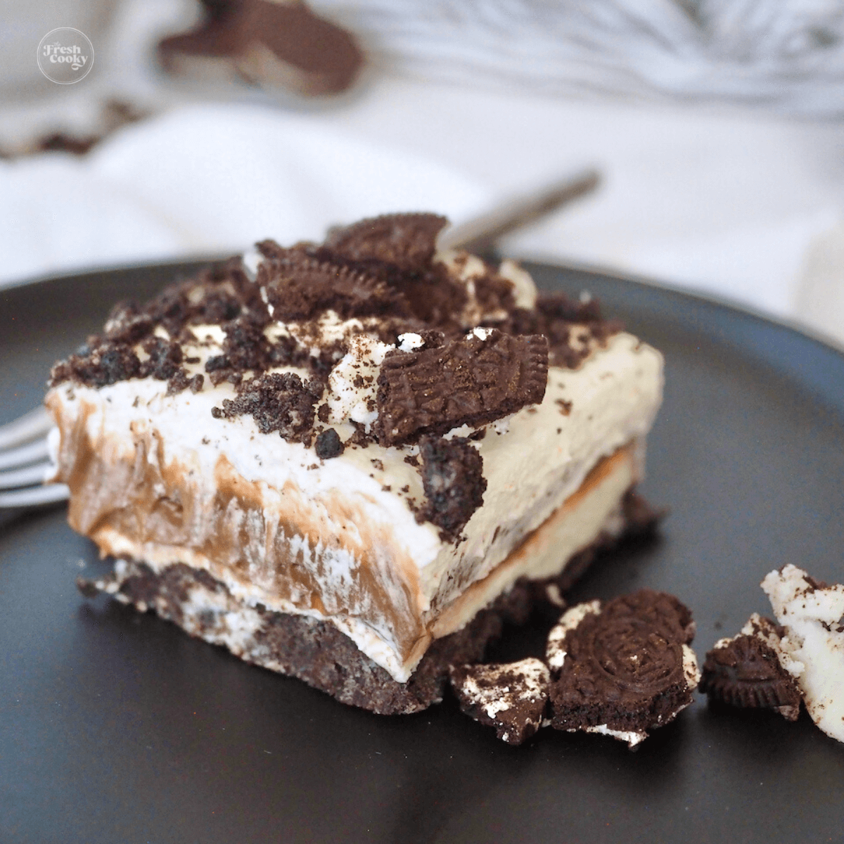 Oreo Dessert with no Cool Whip on plate with fork.