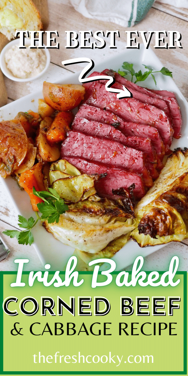 Irish Baked Corned Beef with cabbage recipe is an easy, delicious and traditional Irish dinner, image of corned beef on platter surrounded by potatoes, carrots and cabbage.