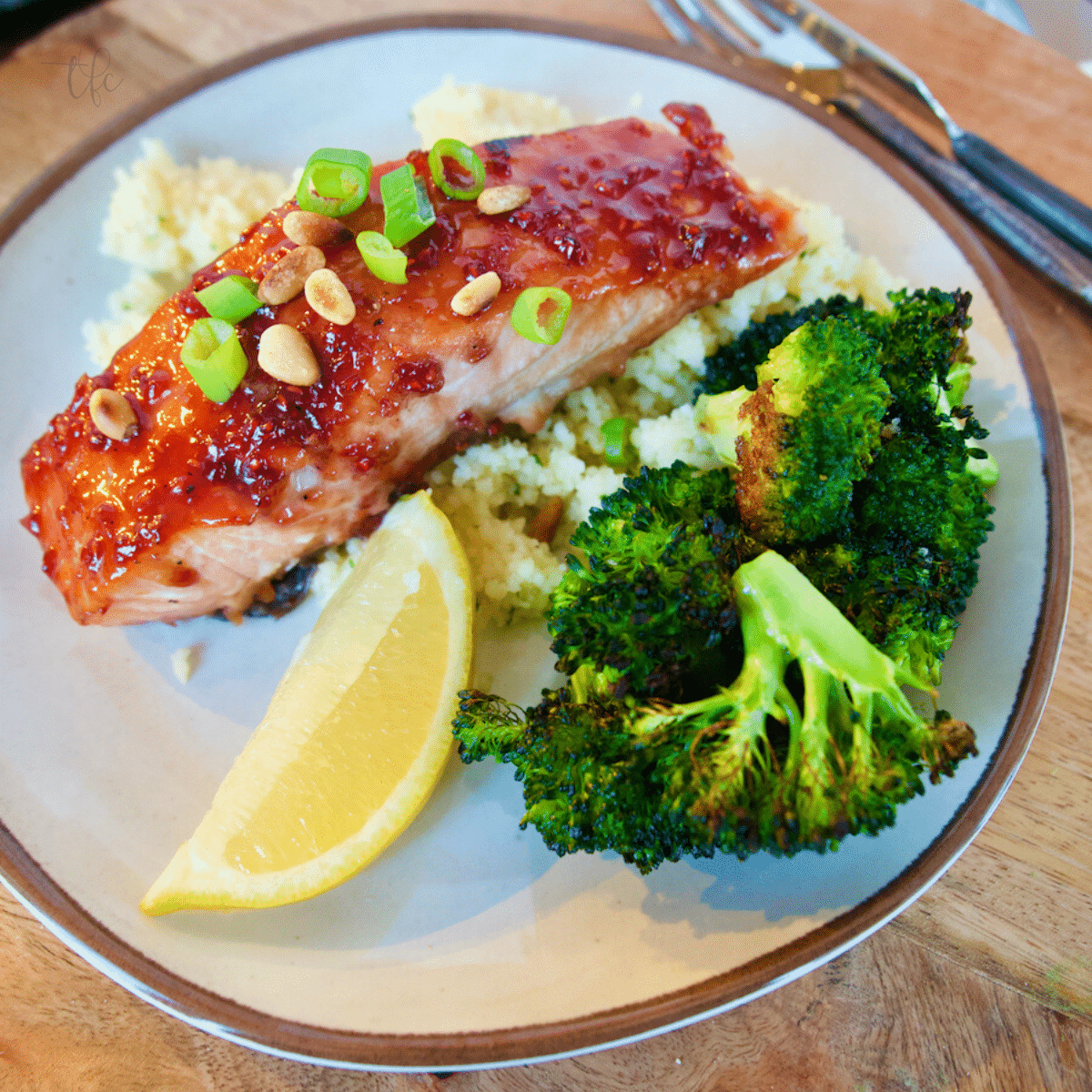 Raspberry Salmon square image with filet of salmon and a raspberry glaze on top.