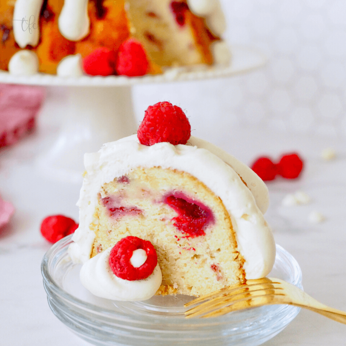 Square image of copycat nothing bundt cake white chocolate raspberry bundt cake.