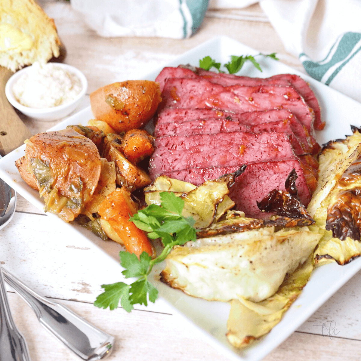 Baked Corned Beef Recipe with cabbage, potatoes, carrots for St. Patrick's day.