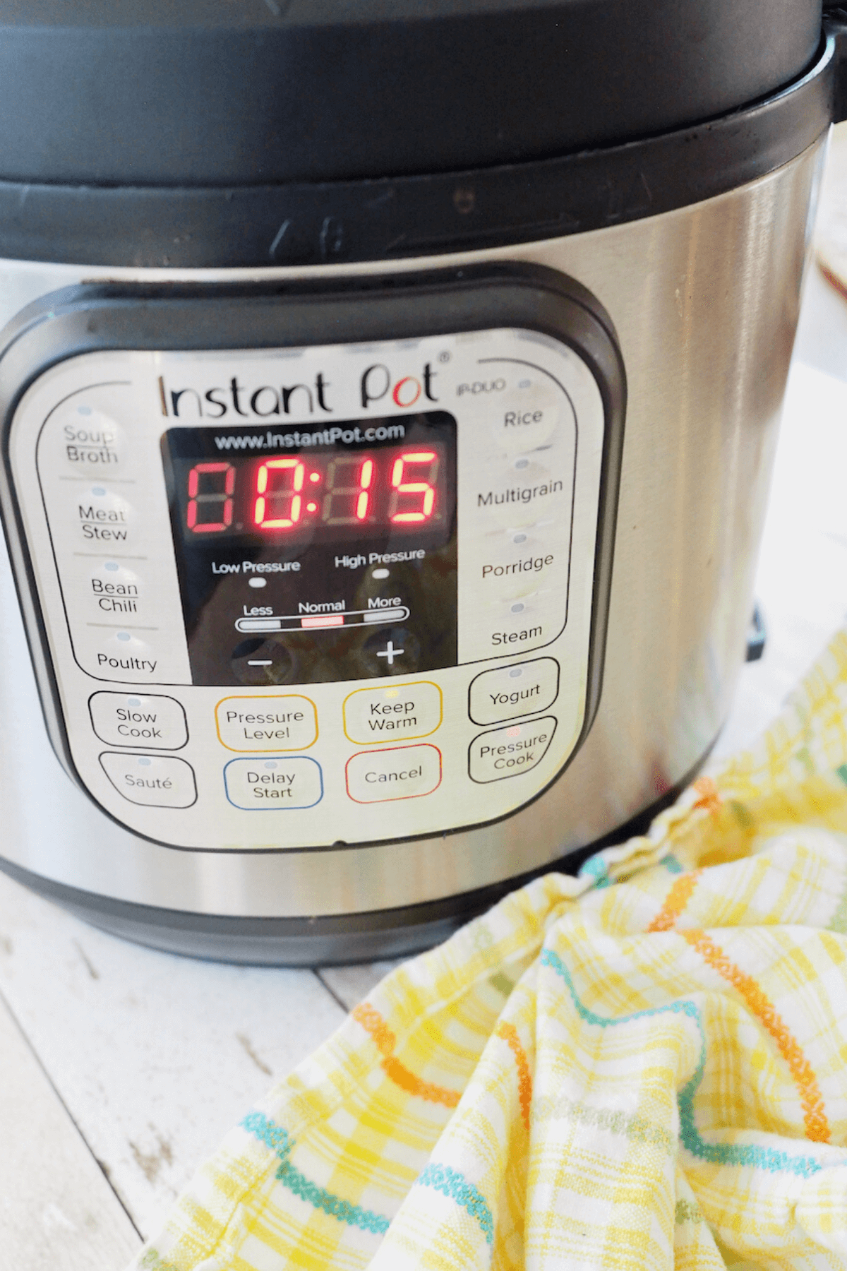 Timer set to 15 minutes pressure cook on Instant Pot.