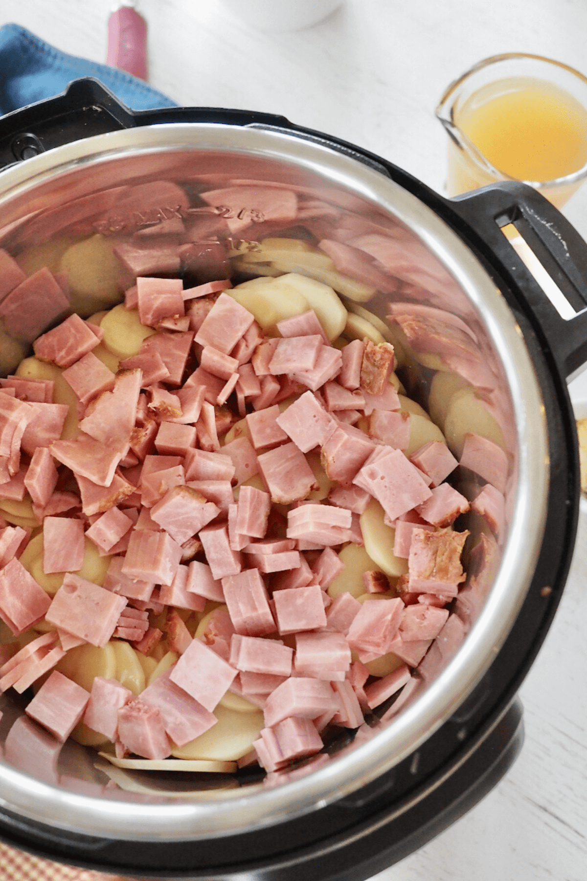 Ham added into instant pot. 