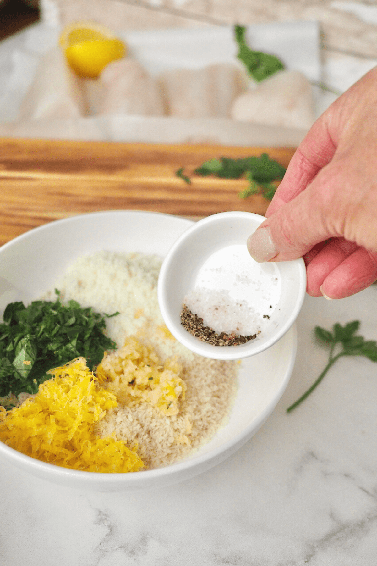 Combine panko, parmesan, parsley, lemon zest, garlic and salt and pepper. 