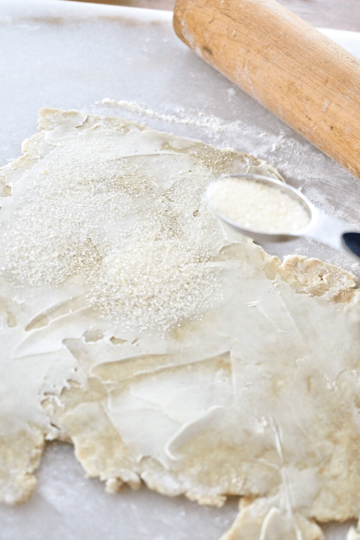 sprinkling sugar on top of buttered leftover pastry pie dough. 