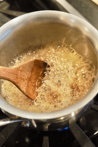 Lemon butter sauce in saucepan.