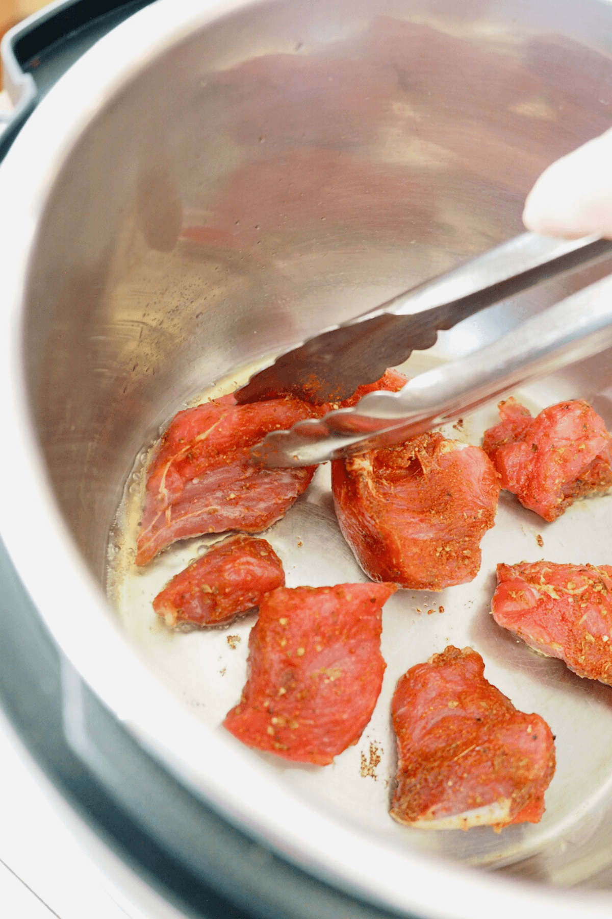 Place pork on hot instant pot or skillet and sear/brown each side.
