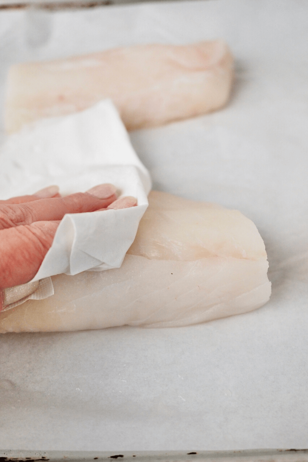Pat dry the cod with paper towels. 