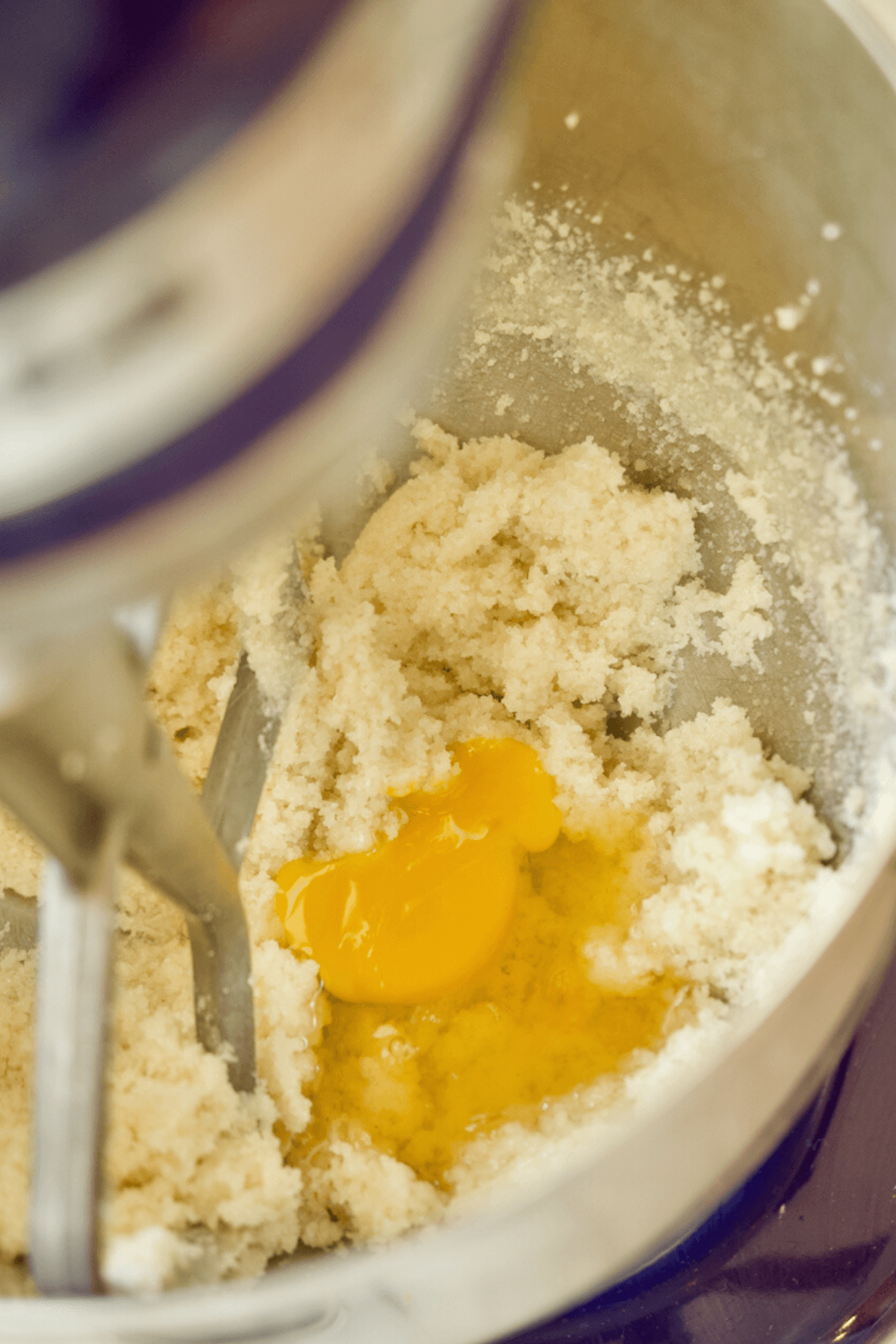 Creamed butter and sugar with added egg and vanilla for rhubarb cake.