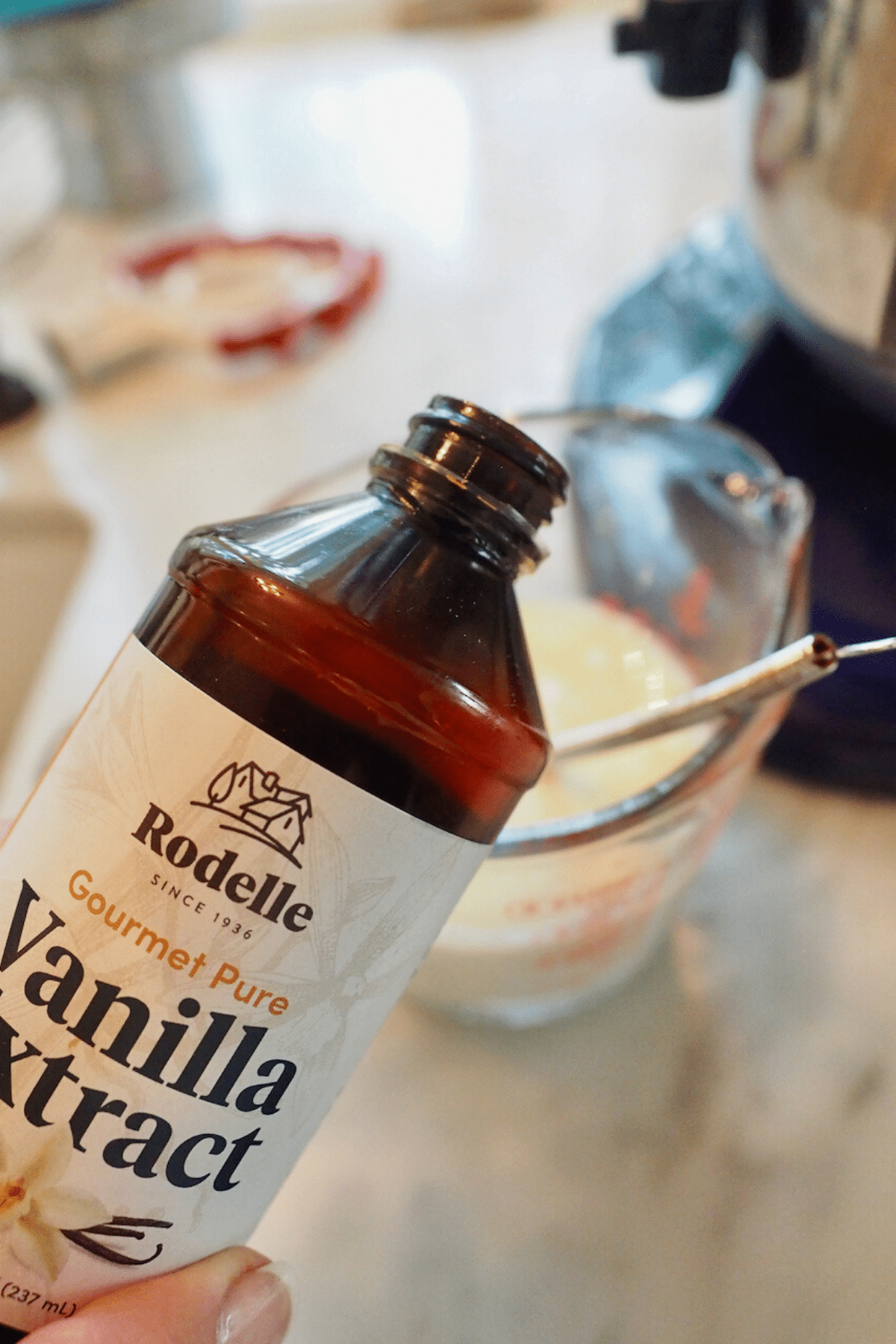 Pouring Rodelle Vanilla into buttermilk mixture. 